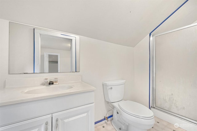 bathroom with vanity, toilet, a shower with door, and wood-type flooring