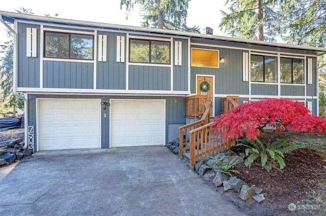 raised ranch featuring a garage