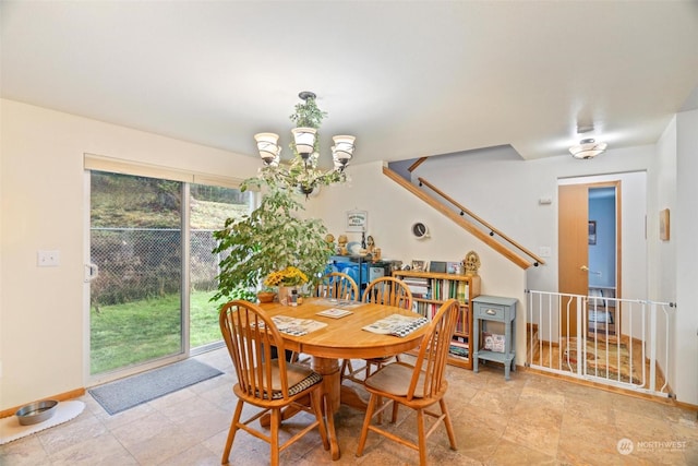 dining area with a notable chandelier