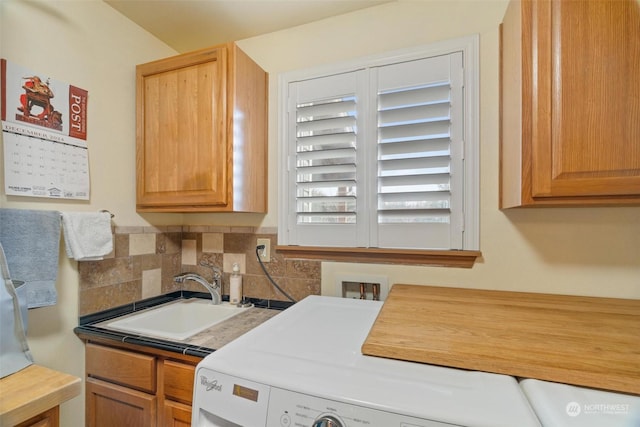 kitchen featuring sink and decorative backsplash