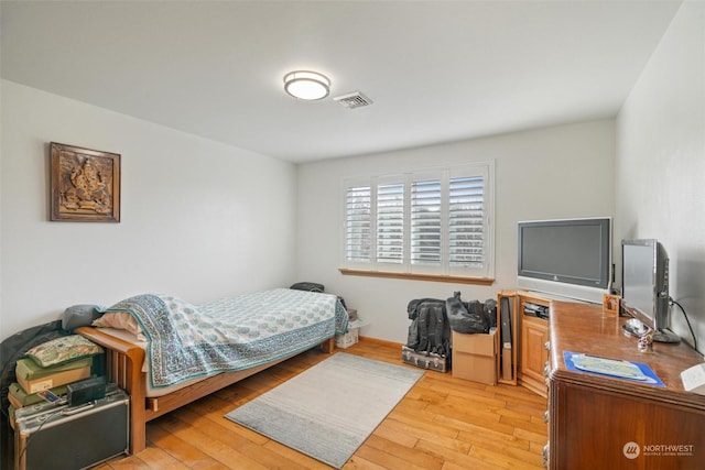 bedroom featuring light hardwood / wood-style floors