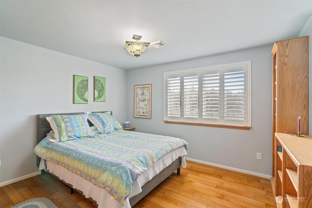 bedroom featuring light wood-type flooring