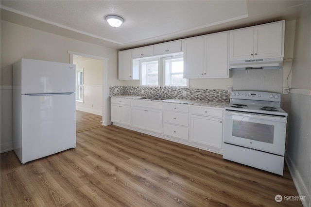 kitchen featuring white cabinetry, white appliances, and light hardwood / wood-style flooring