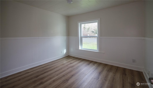 spare room featuring hardwood / wood-style floors