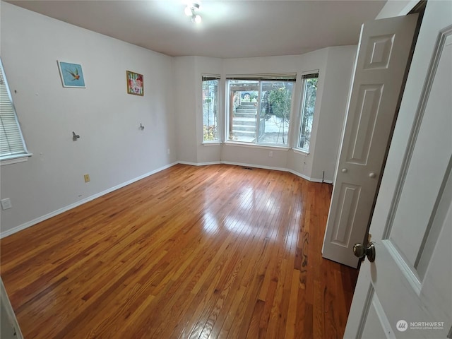 empty room featuring light hardwood / wood-style floors