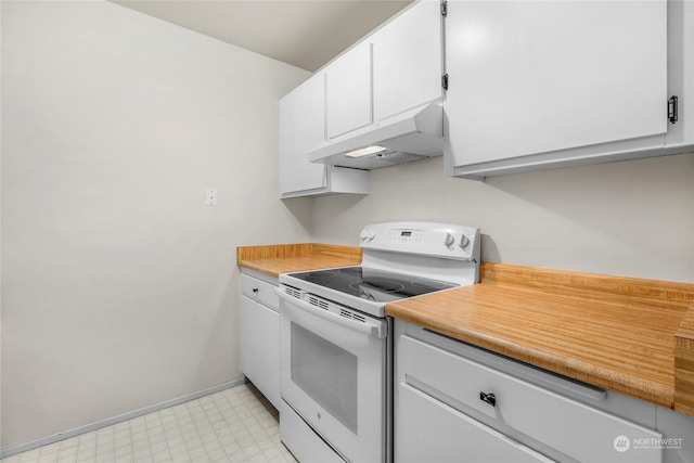 kitchen featuring white cabinets, white electric stove, and range hood