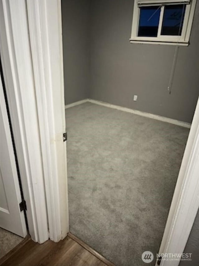 empty room featuring hardwood / wood-style floors