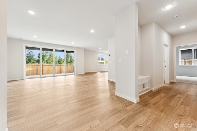 spare room featuring light hardwood / wood-style floors