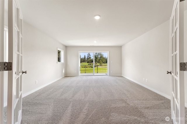 view of carpeted spare room