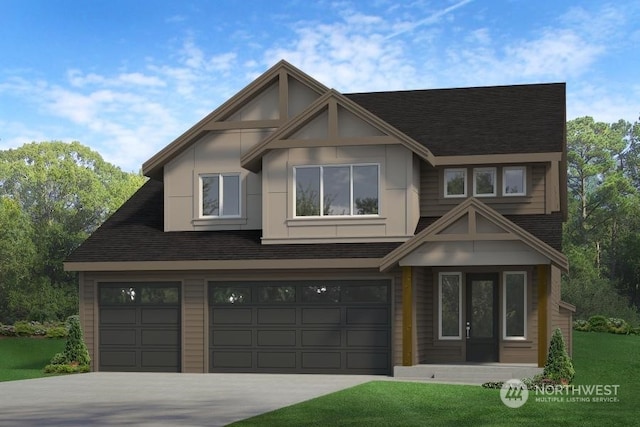 view of front of house featuring a front lawn and a garage