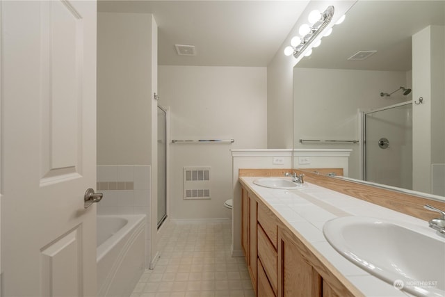 full bathroom with separate shower and tub, vanity, and toilet