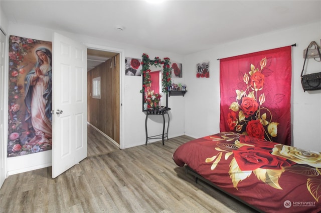 bedroom featuring hardwood / wood-style floors