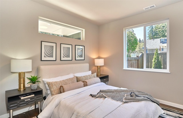 bedroom featuring wood-type flooring