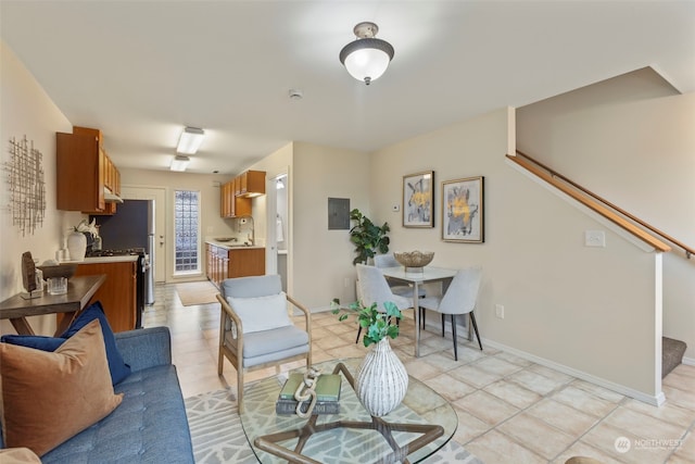 tiled living room featuring electric panel