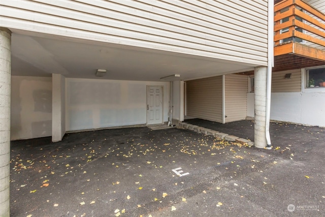 exterior space featuring a carport