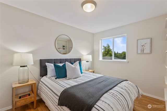 bedroom featuring hardwood / wood-style floors