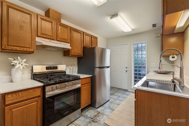 kitchen featuring appliances with stainless steel finishes and sink