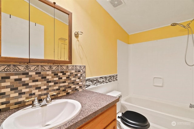 full bathroom featuring vanity, toilet, and shower / tub combination