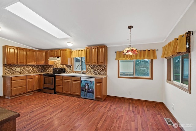 kitchen featuring backsplash, pendant lighting, black dishwasher, dark hardwood / wood-style floors, and stainless steel range with electric cooktop