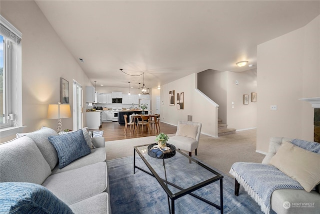 living room featuring an inviting chandelier