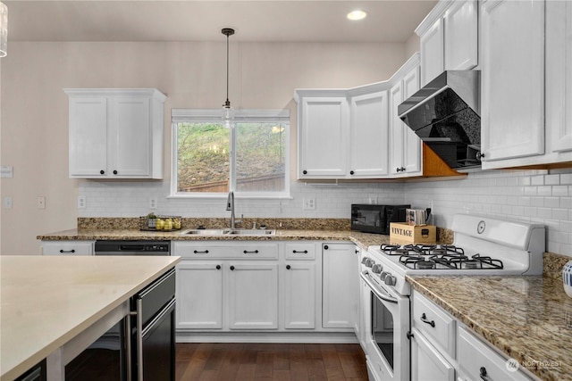 kitchen featuring white gas range, wall chimney exhaust hood, white cabinets, and sink