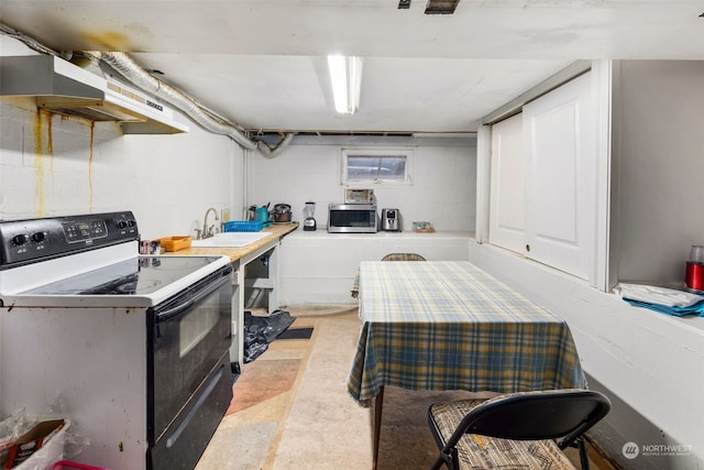 kitchen featuring sink and white electric range