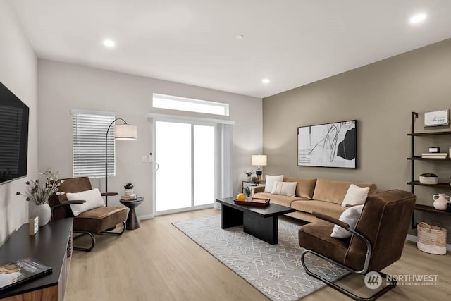 living room with light hardwood / wood-style floors