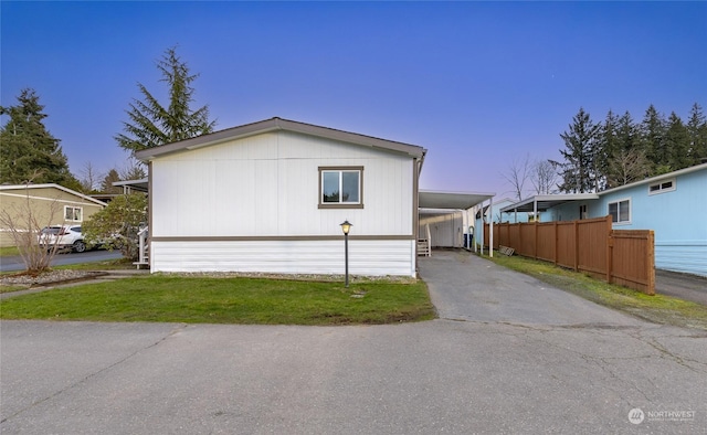 view of front of house featuring a carport