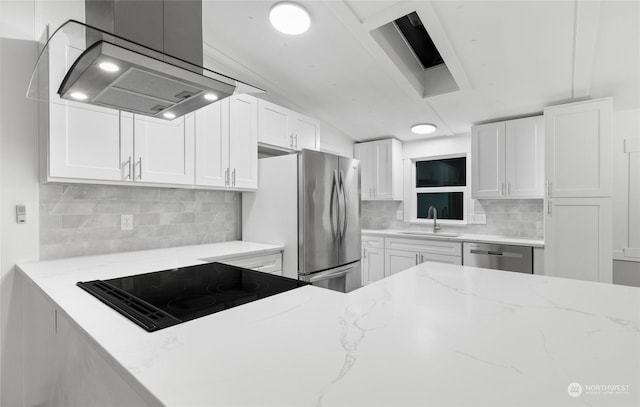 kitchen with white cabinets, stainless steel appliances, and sink