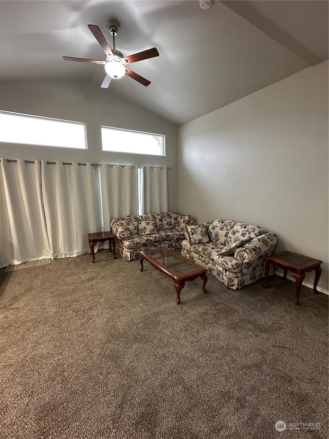 living room featuring carpet floors, vaulted ceiling, and ceiling fan