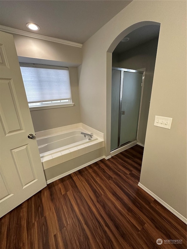 150 K St NE, Ephrata, WA 98823 - full bath featuring wood finished floors, a stall shower, a bath, and recessed lighting