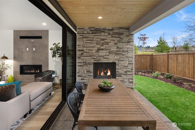 view of patio / terrace with a fireplace