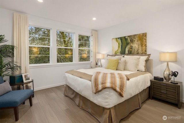 bedroom featuring light hardwood / wood-style floors