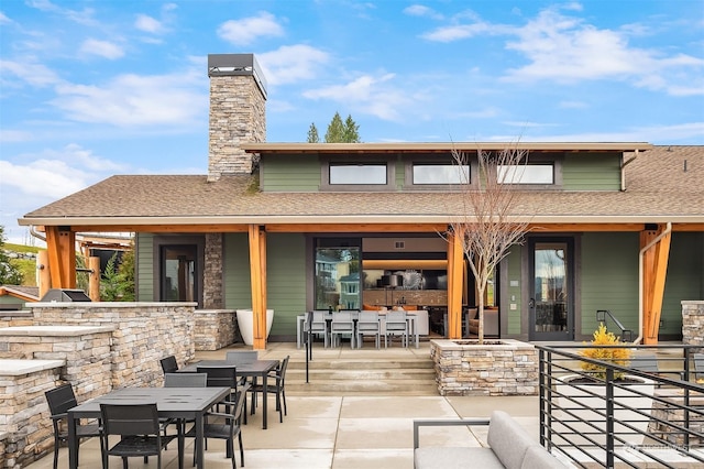 rear view of house featuring a patio