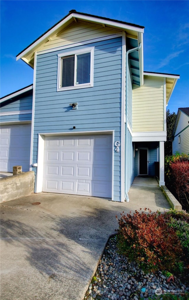 view of front of home with a garage