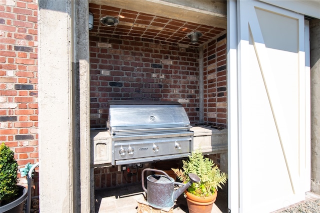 view of patio / terrace featuring grilling area and exterior kitchen