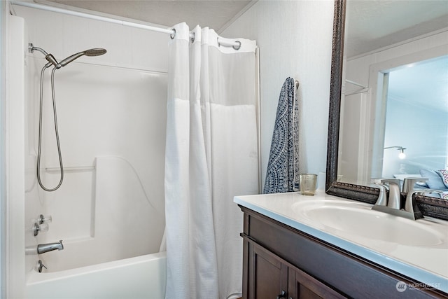 bathroom featuring vanity and shower / bath combo with shower curtain