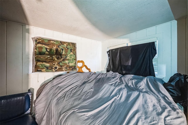 bedroom featuring a textured ceiling