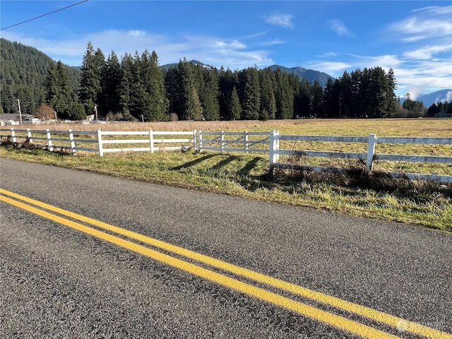 view of street featuring a mountain view and a rural view