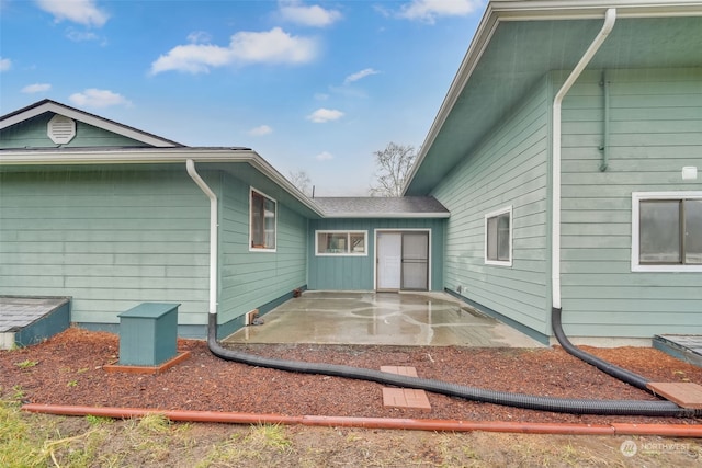 view of property exterior featuring a patio area