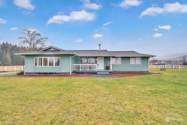 single story home with a front yard