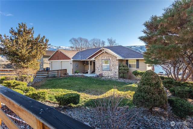 ranch-style house featuring a garage and a front yard