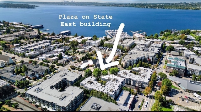 drone / aerial view featuring a water view