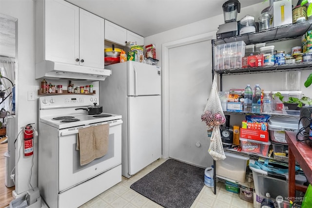 kitchen with white cabinets and white appliances