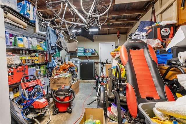 storage featuring washer and dryer