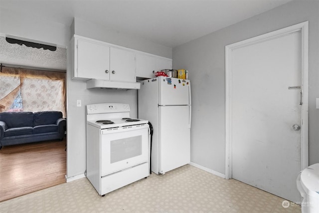 kitchen featuring white appliances, light hardwood / wood-style floors, and white cabinetry