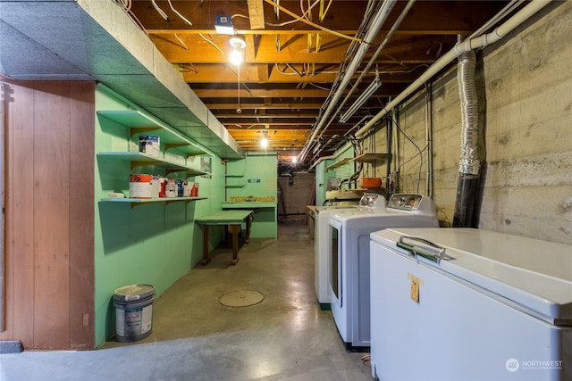 laundry area featuring washing machine and clothes dryer