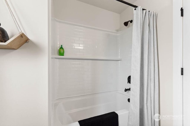 bathroom featuring shower / bath combination with curtain