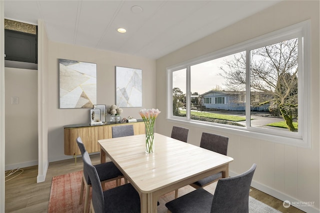 dining room with hardwood / wood-style floors