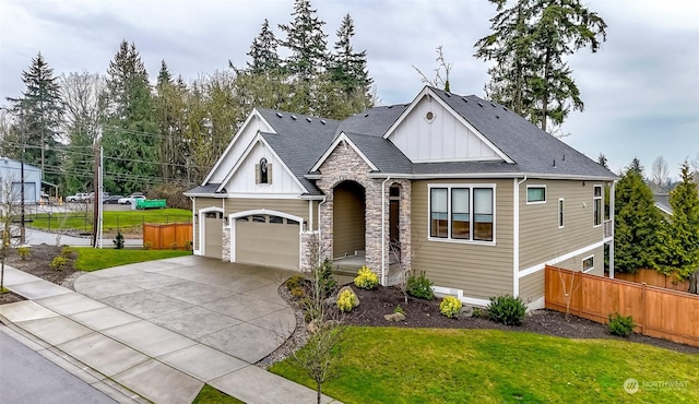 view of front of house with a garage and a front yard